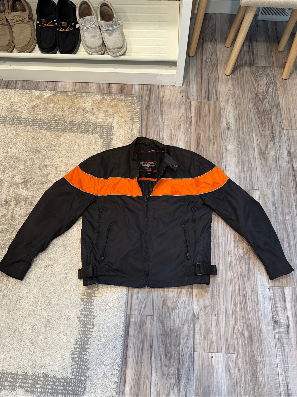 Revolution Black Jacket with Orange Chest Stripe